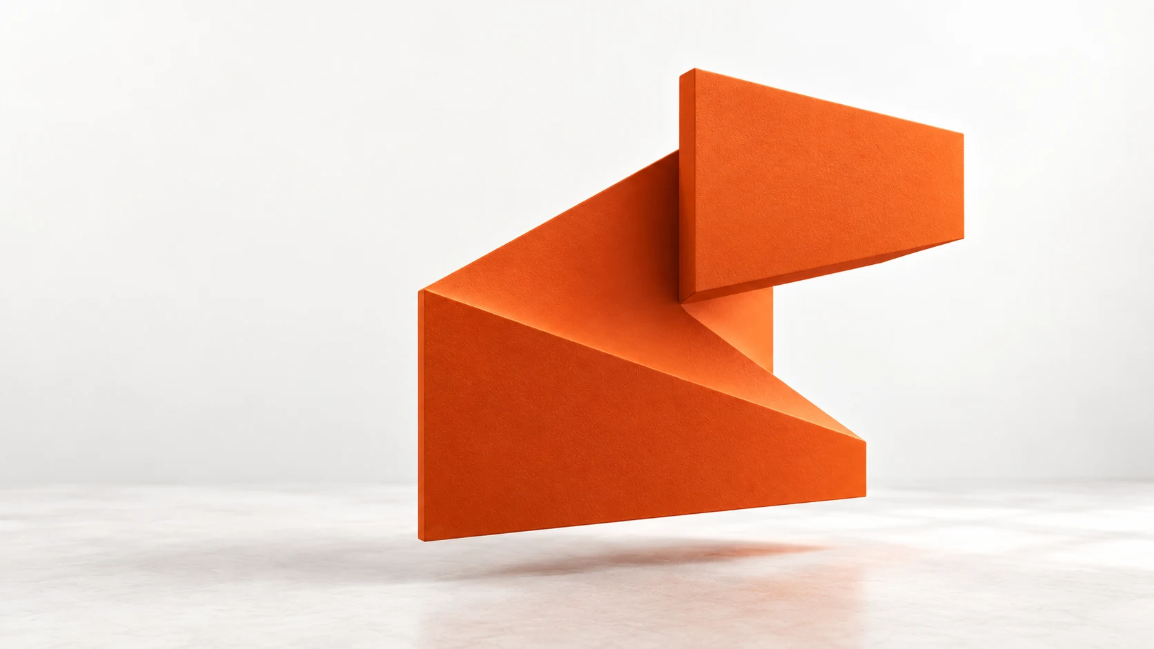 Le pli architectural orange de Stoa et son ombre sur un fond clair